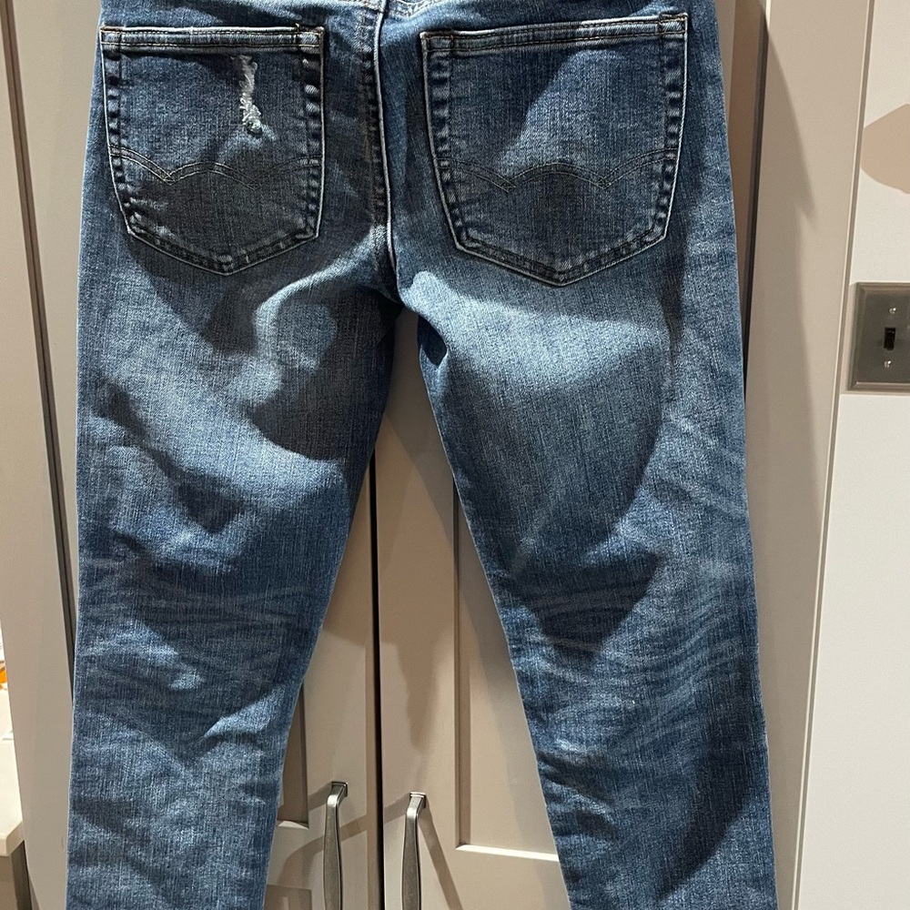 American Eagle Outfitters Ripped Blue Skinny Jeans - Picture 5 of 8